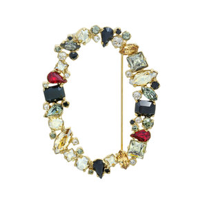 PRECIOUS OVAL - An oval of light! This brooch can highlight any look.
Jewel made of light gold and multicoloured stones. - A.Z. Bigiotterie