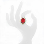 ELIZABETH - ELIZABETH is a simply regal ring. Precious, shiny...you will grab the spotlight!
It's a jewel made of light gold and rhodium with crystals and central ruby stone.

Size from 9 to 25. - A.Z. Bigiotterie