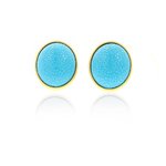 BARBARA - An oval shaped earring with thin metal border, a charge of light on your face!
Jewel made of light gold and turquoise resin. - A.Z. Bigiotterie