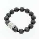 Rodhium with hematite pearls and black and white crystals
