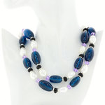 Rodhium with dark blue resin alternated with pearl, black resin and violet pearl