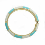 SMALL PERFECT CIRCLE - SMALL PERFECT CIRCLE &egrave; un bangle a base oro chiaro con alternanza di smalto bianco e turchese chiaro. &Egrave; perfetto per un outift da ogni giorno! - A.Z. Bigiotterie